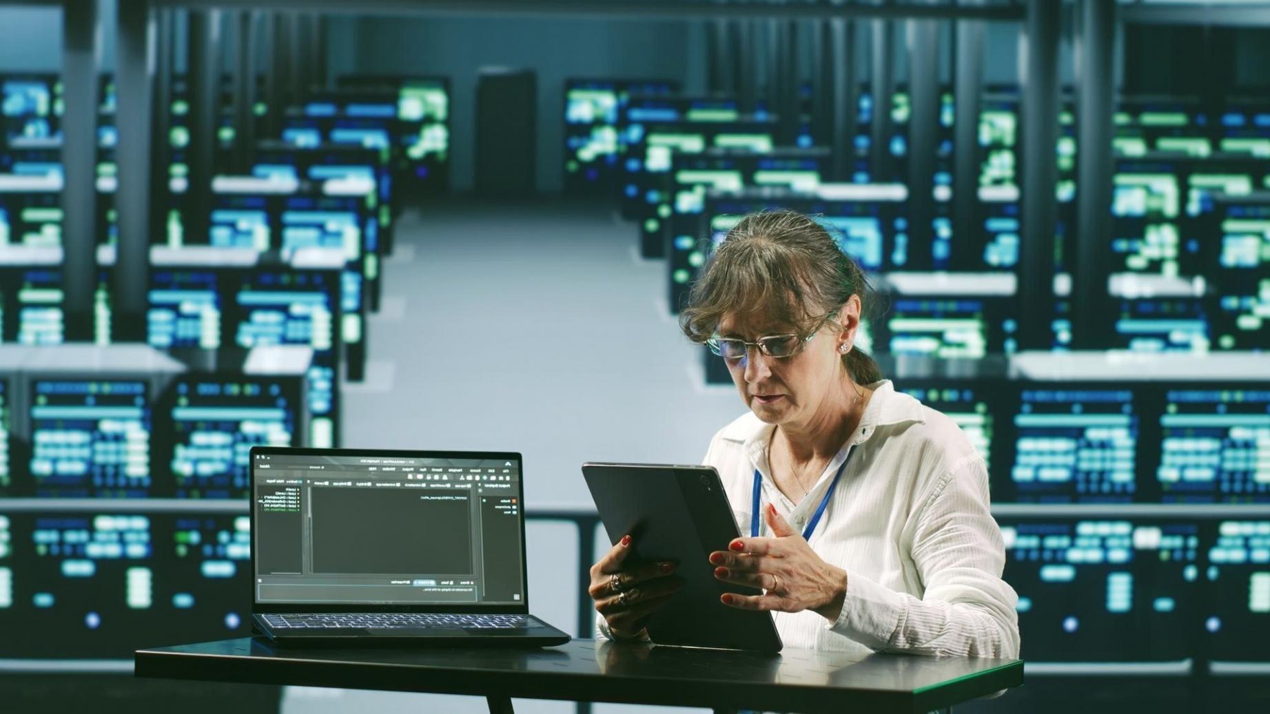 Technical workspace showing chatbot maintenance environment with monitoring systems and development tools